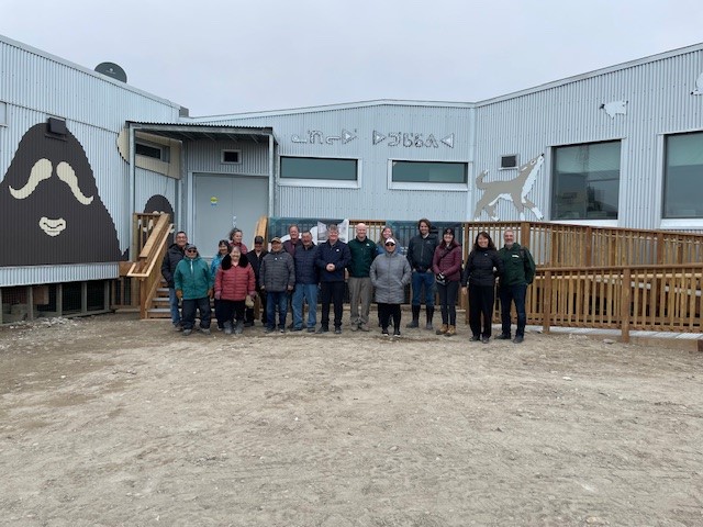 Dignitaries gathering outside the Nattilik Heritage Centre after the grand opening.